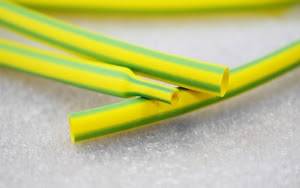 Yellow Green Heat Shrink Tube 12mm Image of 12mm yellow/green heat shrink tubing, 100m roll for ground wire insulation